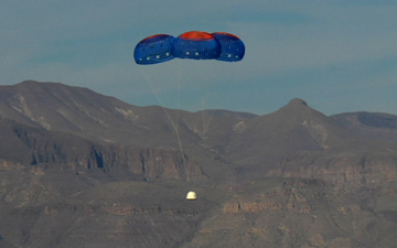 Blue Origin's New Shepard crew capsule escaped to an altitude of 2,307 feet before deploying parachutes for a safe return Oct. 19. Image credit: Blue Origin